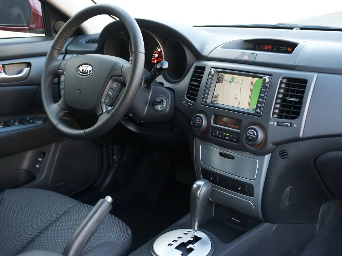 Kia Optima II Рестайлинг Седан — фото 6