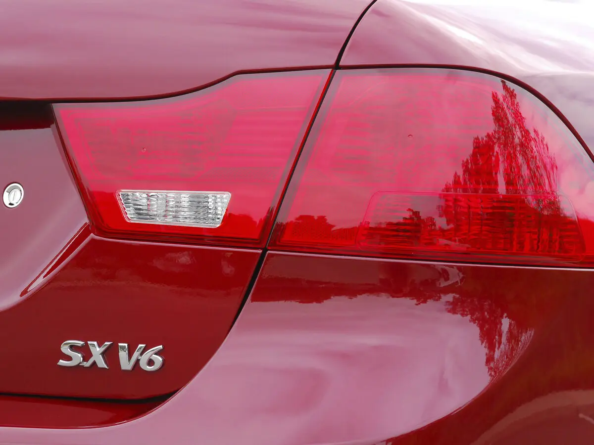 Kia Optima II Рестайлинг Седан — фото 10