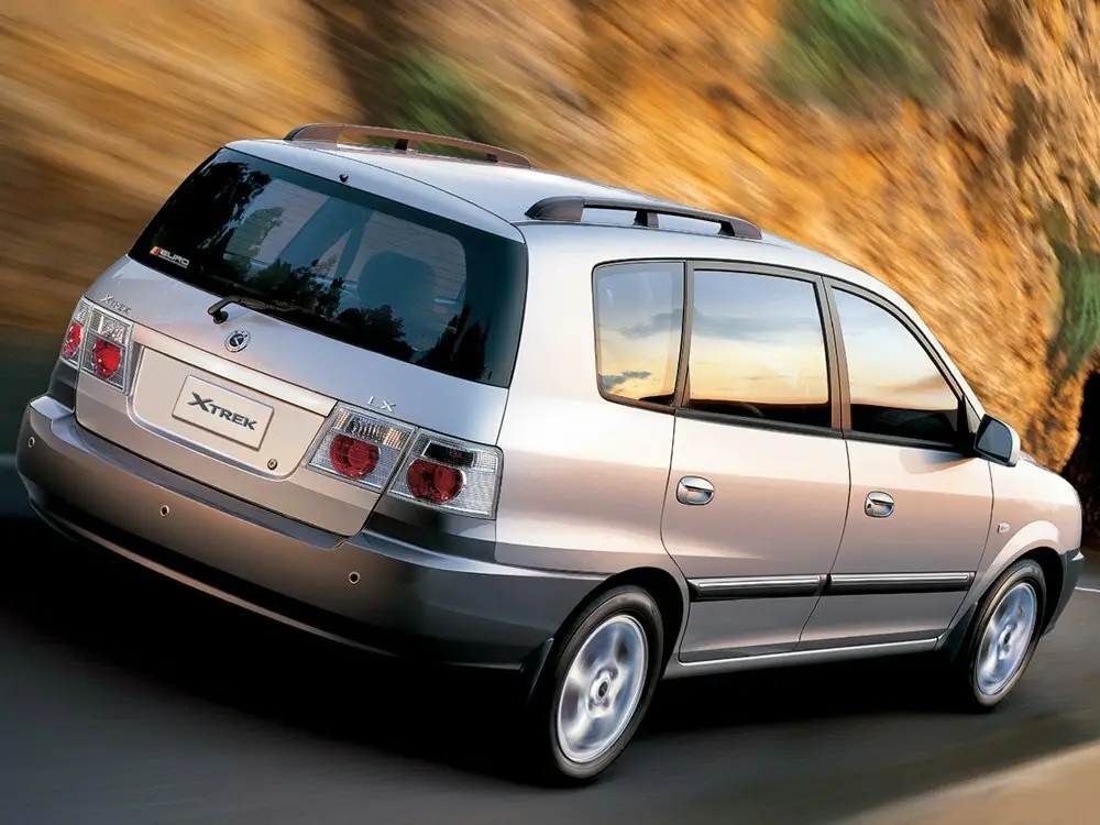 Kia X-Trek 2003 – 2006 Компактвэн — сүрөт 3