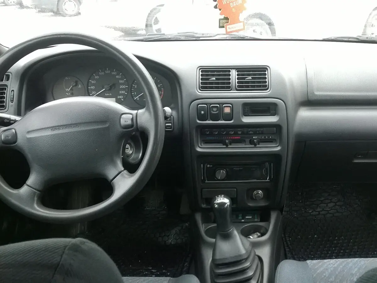 Mazda 323 V (BA) Хэтчбек 3 дв. — фото 8