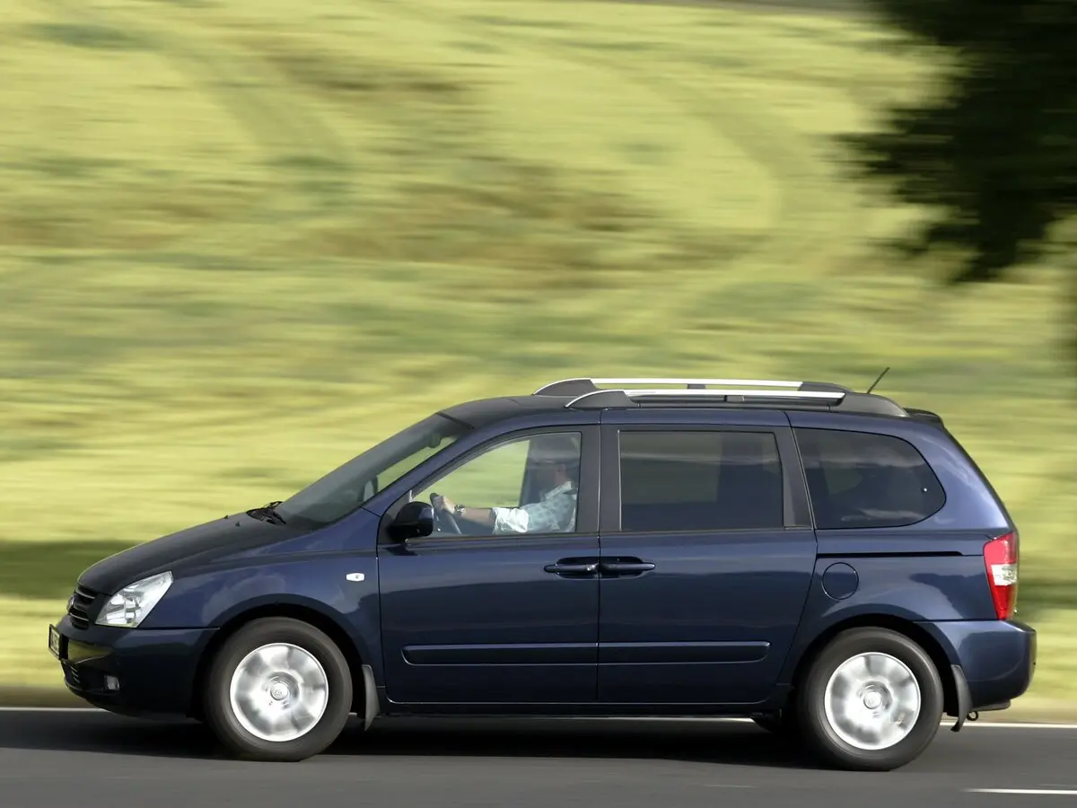 Kia Carnival II Минивэн Grand — фото 2