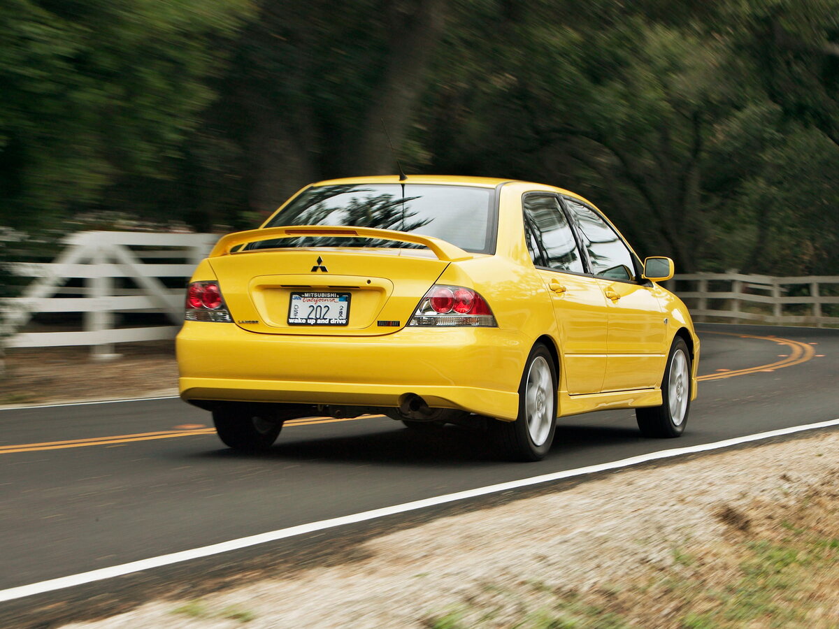 Mitsubishi Lancer Ralliart IX Седан — фото 4