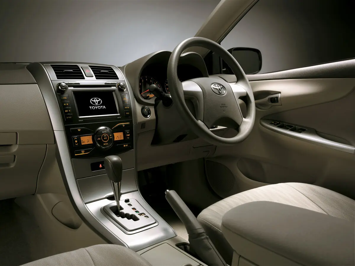 Toyota Corolla X (E140, E150) Седан Axio — фото 5
