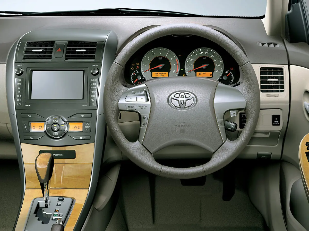 Toyota Corolla X (E140, E150) Седан Axio — фото 6