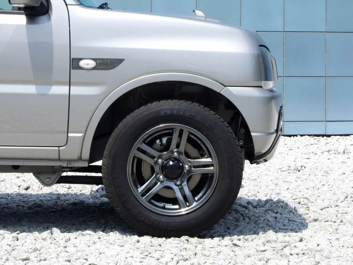 Suzuki Jimny III Рестайлинг 2 Внедорожник 3 дв. Kei car — фото 12