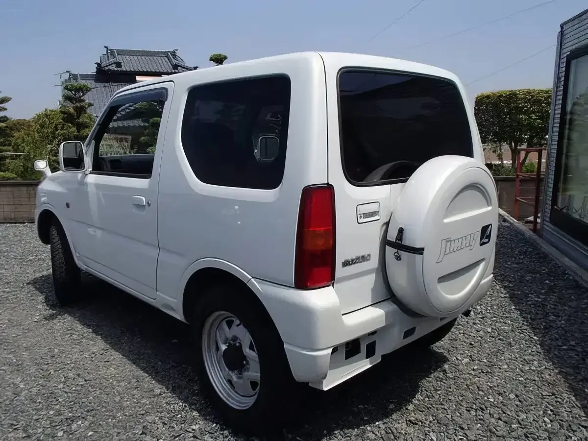 Suzuki Jimny III Внедорожник 3 дв. Kei car — фото 3