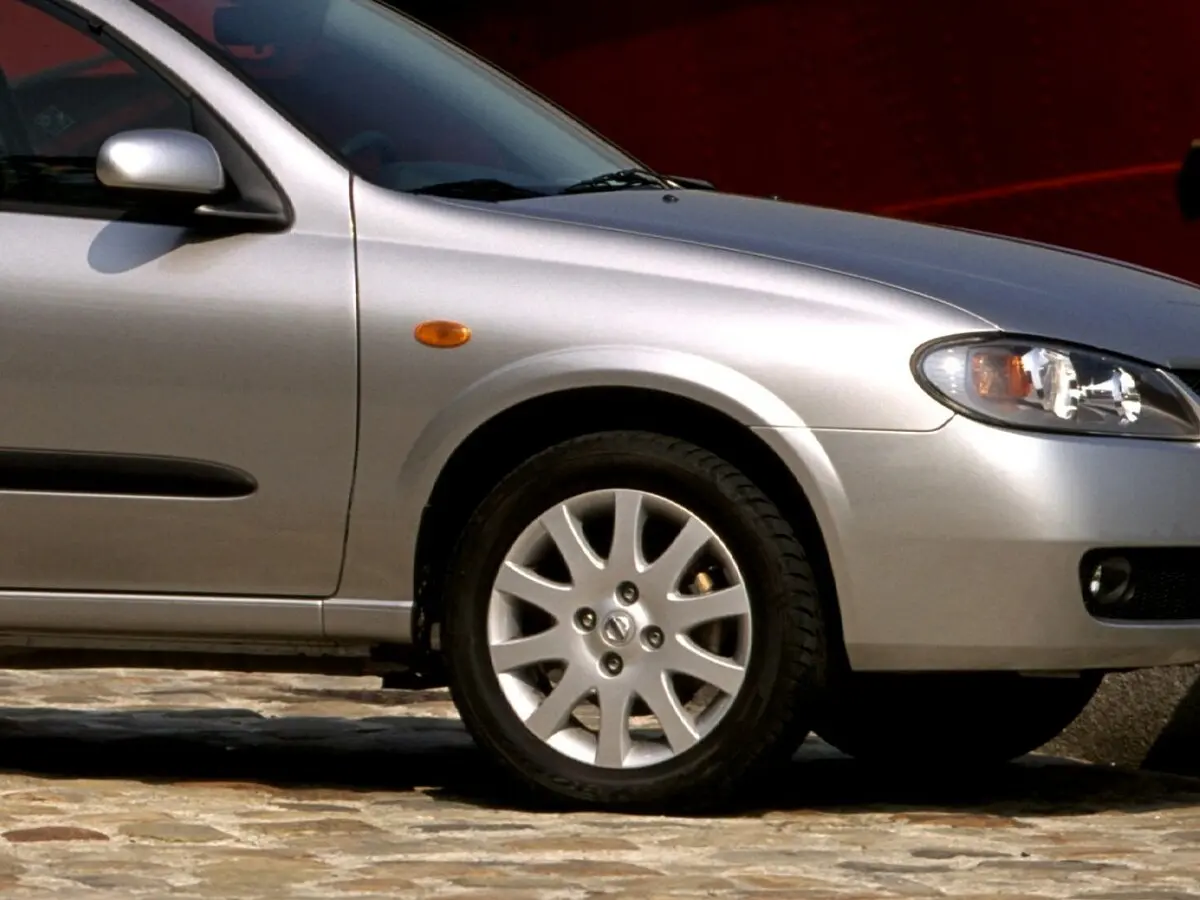Nissan Almera II (N16) Рестайлинг Хэтчбек 3 дв. — сүрөт 12