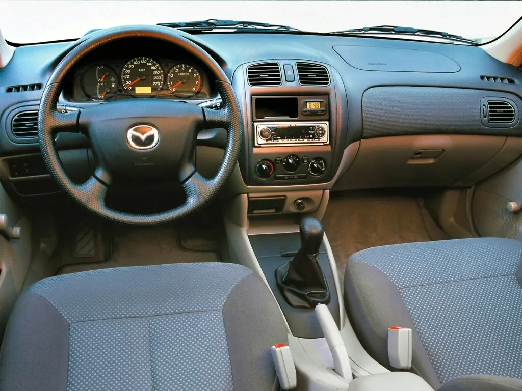 Mazda 323 VI (BJ) Седан — фото 4