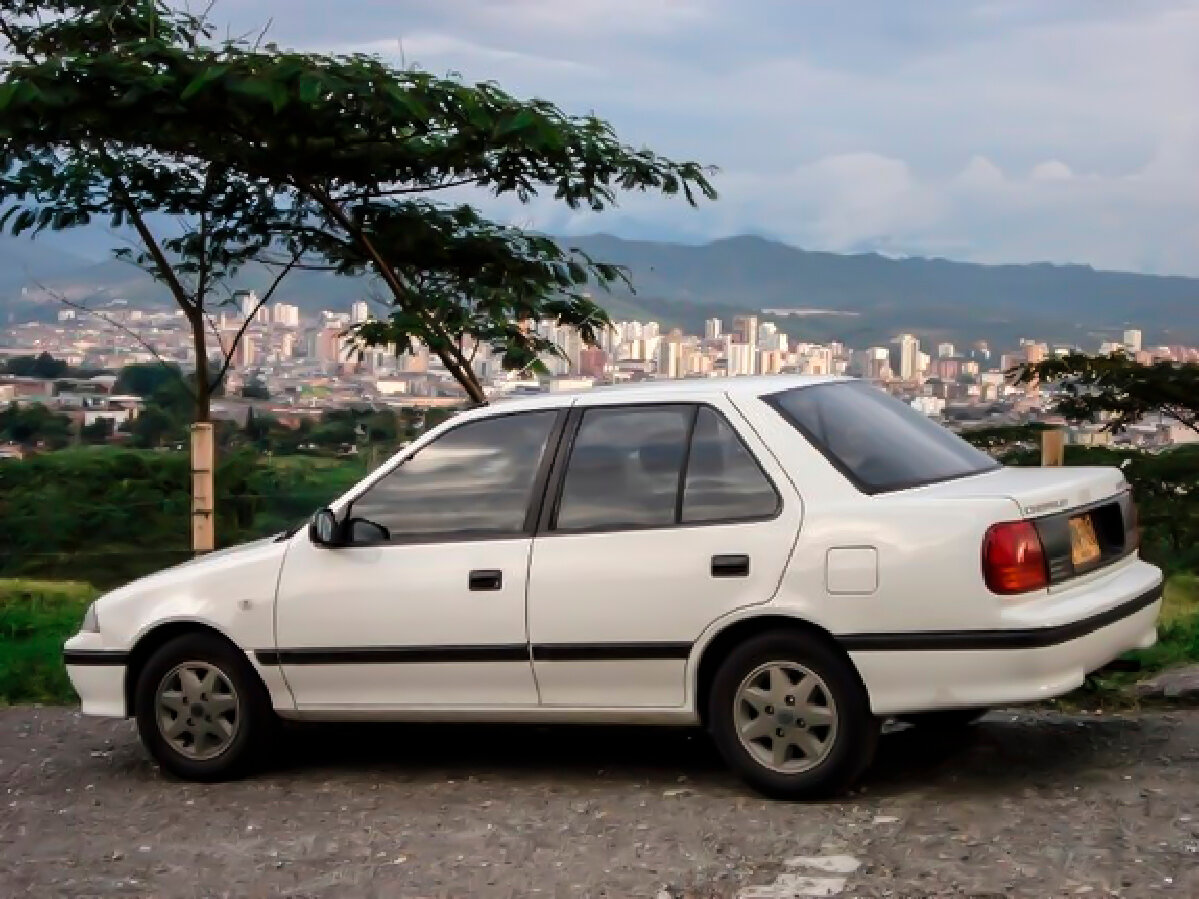 Suzuki Swift II Рестайлинг Седан — фото 2
